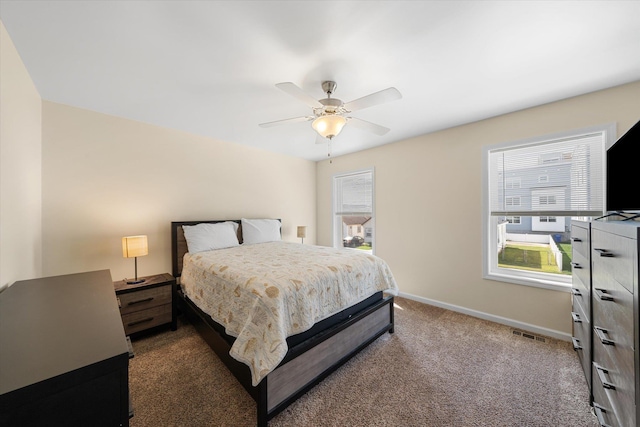 carpeted bedroom featuring ceiling fan