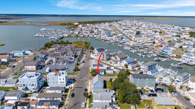 drone / aerial view featuring a water view