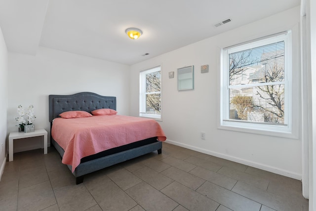 138 E Youngs Ave Unit 1, Wildwood, NJ 08260 - tiled bedroom featuring multiple windows