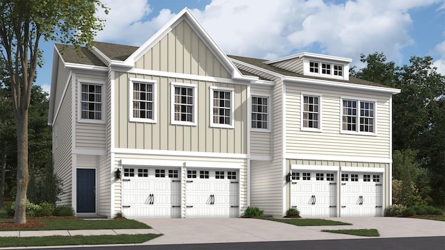 view of front of house featuring an attached garage, roof with shingles, board and batten siding, and concrete driveway