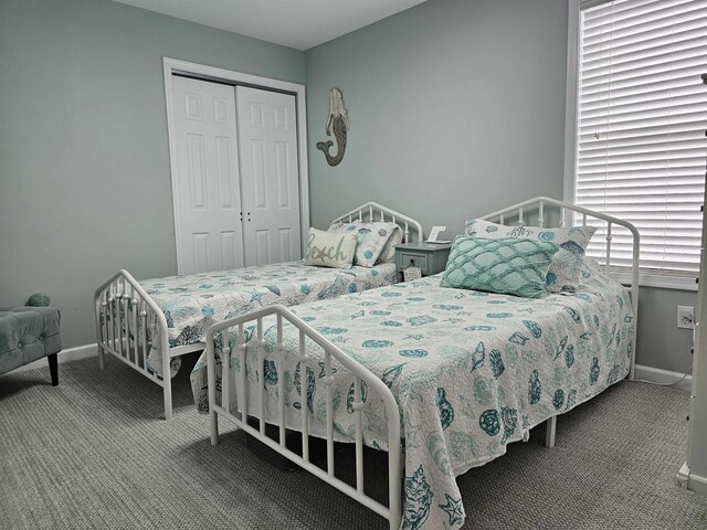 134 E Sweetbriar Rd Unit 134, Wildwood Crest, NJ 08260 - carpeted bedroom featuring a closet and baseboards