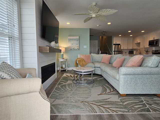 134 E Sweetbriar Rd Unit 134, Wildwood Crest, NJ 08260 - living room with dark wood-type flooring, a fireplace, a ceiling fan, and recessed lighting