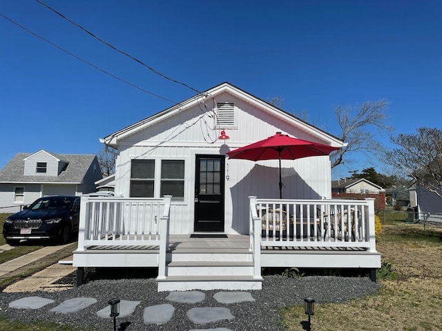 bungalow-style house featuring a deck