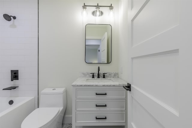 bathroom with toilet, shower / bathtub combination, and vanity