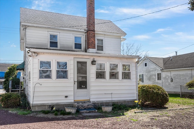 2090 Rte 50, Tuckahoe, NJ 08270 - back of house with entry steps, a shingled roof, and a chimney