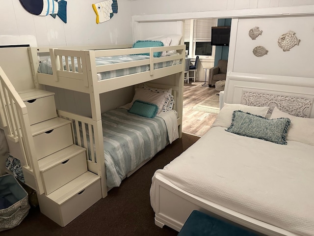 bedroom featuring wood finished floors