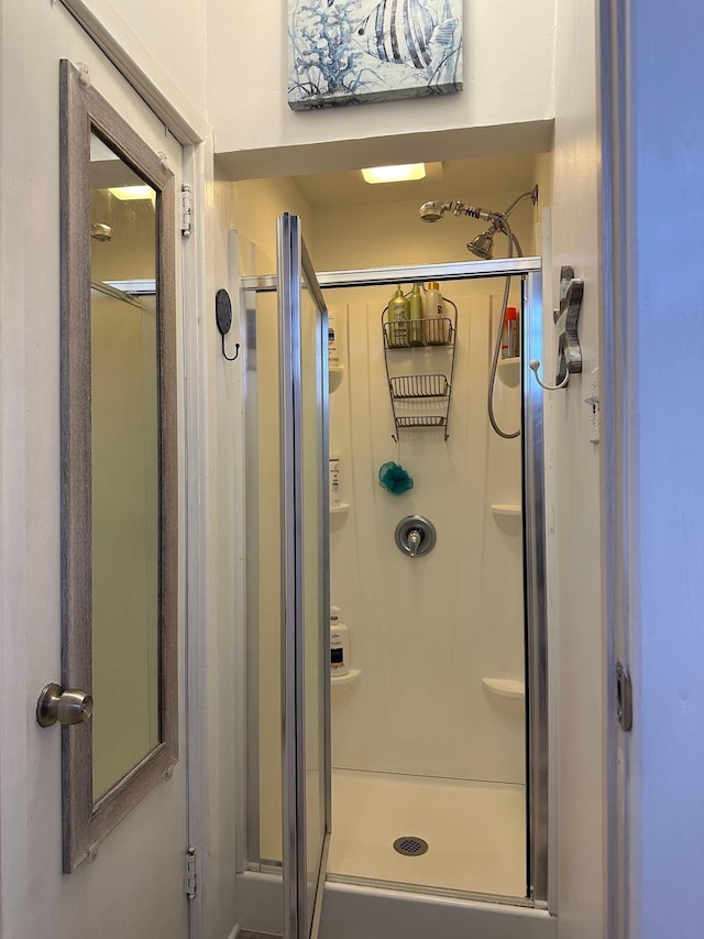 full bathroom with a stall shower