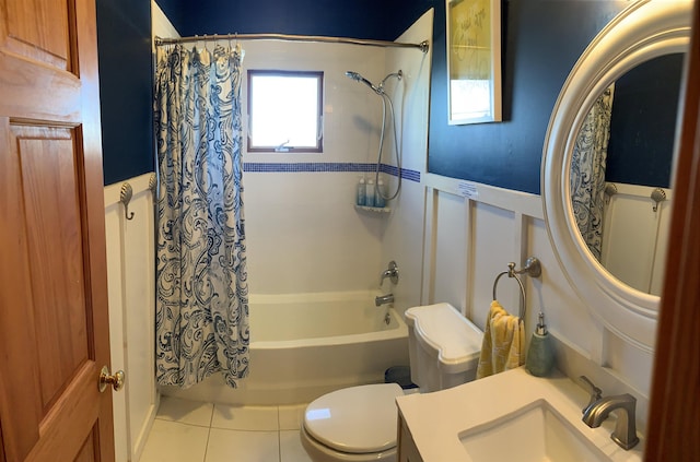 full bathroom with tile patterned flooring, shower / tub combo with curtain, toilet, and vanity