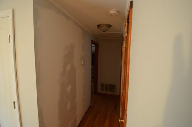 corridor with dark hardwood / wood-style floors