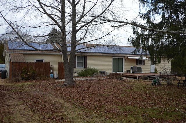 rear view of house with a deck