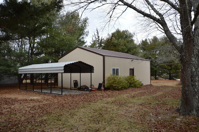 view of outbuilding with a carport