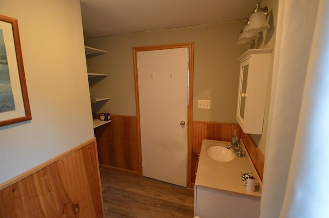 bathroom featuring hardwood / wood-style floors and vanity