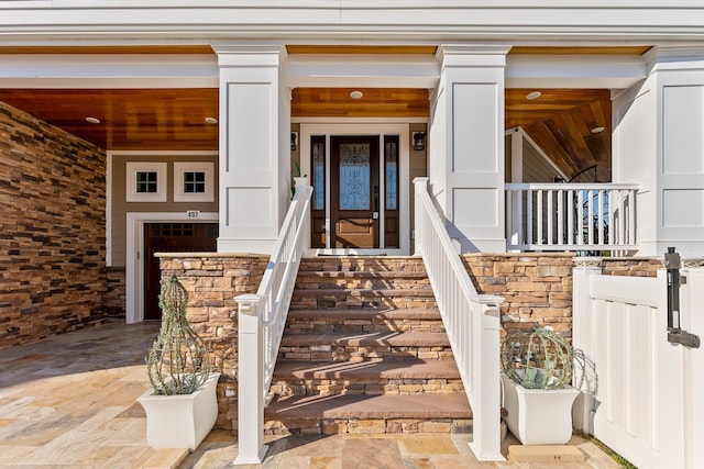 doorway to property with covered porch