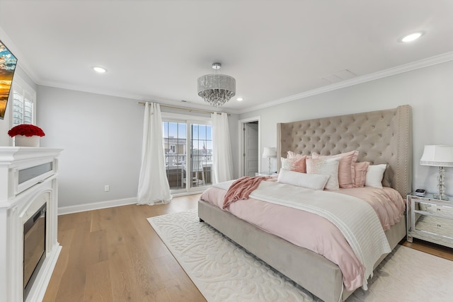 bedroom with baseboards, recessed lighting, a fireplace, crown molding, and light wood-type flooring