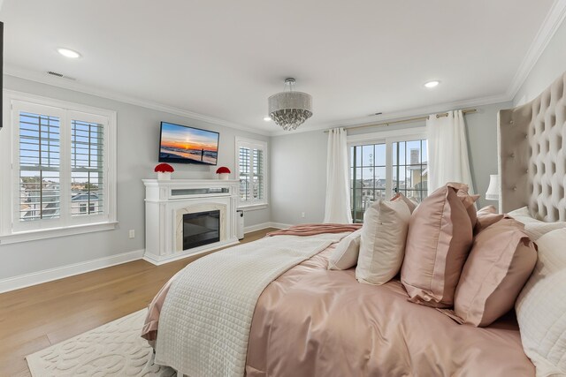 407 Paradise Way Unit 1, North Wildwood, NJ 08260 - bedroom with baseboards, visible vents, crown molding, and wood finished floors