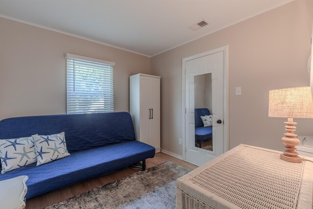 34 Holiday Rd, Villas, NJ 08251 - living area featuring wood finished floors, ornamental molding, and baseboards