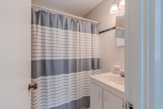 34 Holiday Rd, Villas, NJ 08251 - full bath with tile walls, vanity, and a shower with shower curtain