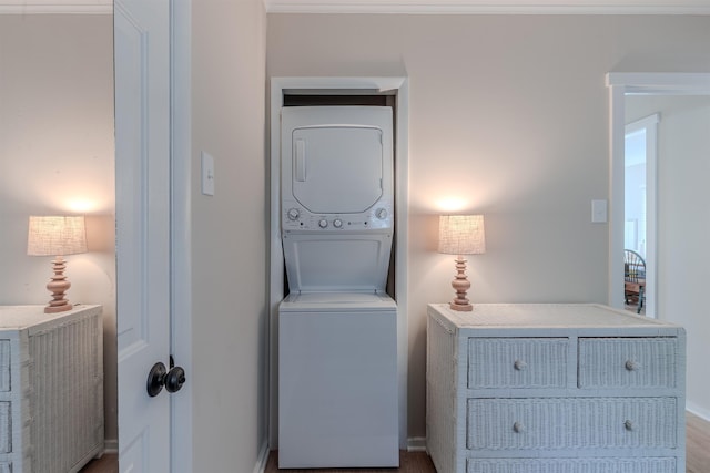 34 Holiday Rd, Villas, NJ 08251 - laundry room with stacked washer / drying machine, wood finished floors, and baseboards
