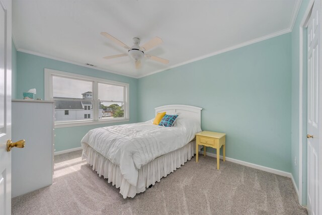 1520 Yacht Ave Unit 203, Cape May, NJ 08204 - carpeted bedroom featuring baseboards, crown molding, and ceiling fan