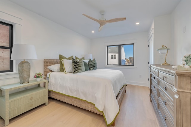 bedroom featuring ceiling fan and light wood-type flooring