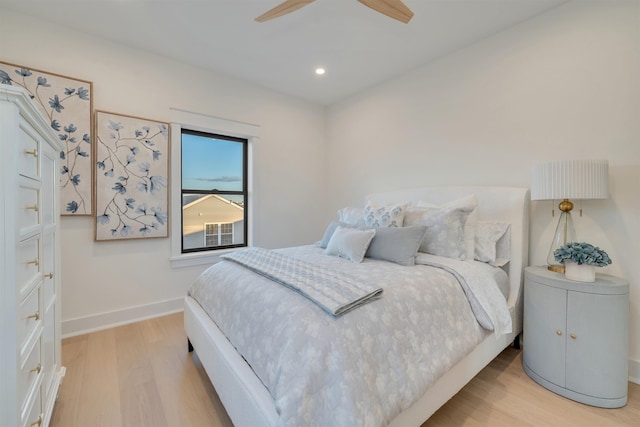 bedroom featuring ceiling fan and light wood-type flooring