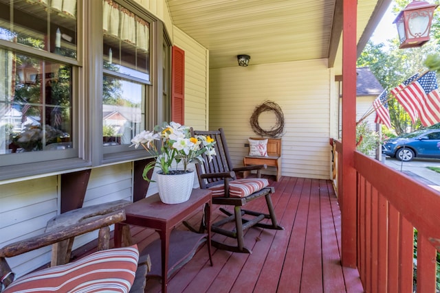 wooden deck featuring a porch