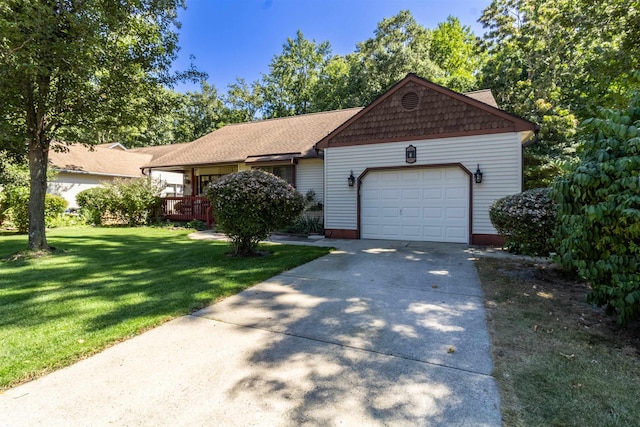 single story home with a front yard and a garage