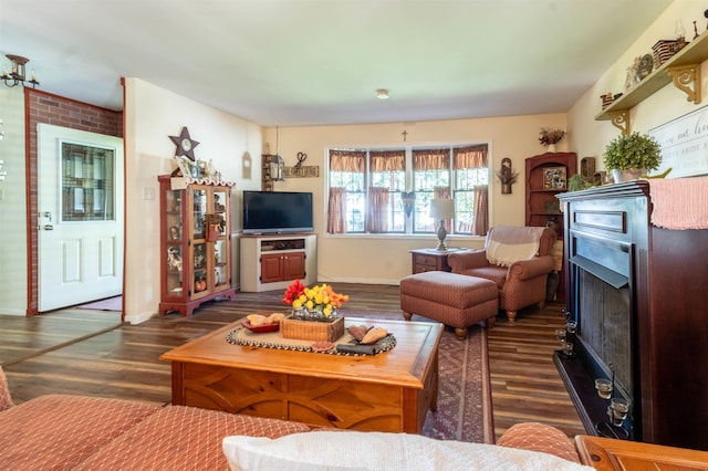 living room with dark hardwood / wood-style floors