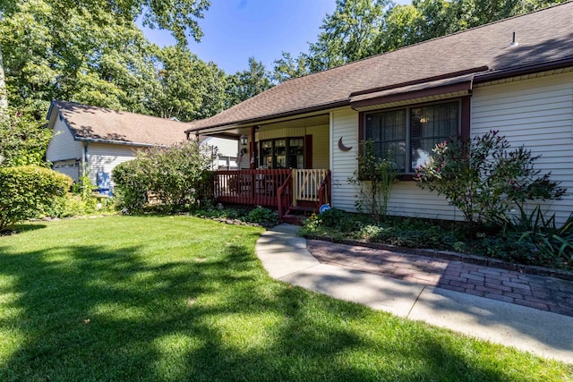 view of front of home with a front yard