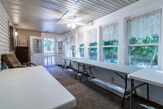 sunroom / solarium with ceiling fan