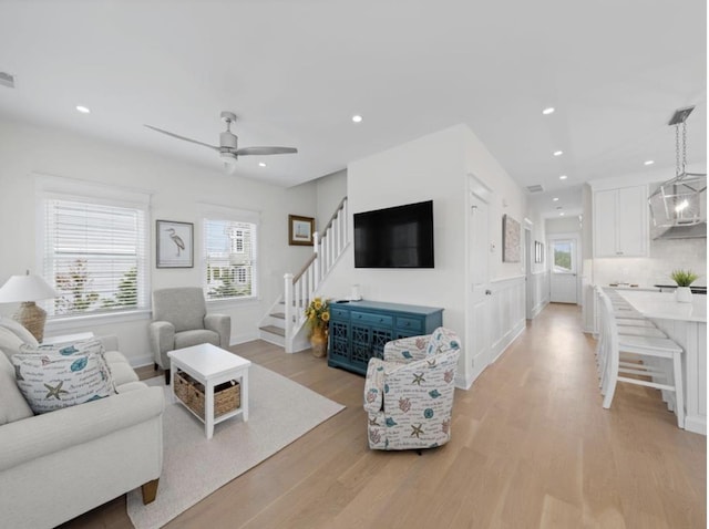 5765 Ocean Dr, Avalon, NJ 08202 - living area with light wood-style floors, stairway, recessed lighting, ceiling fan, and baseboards