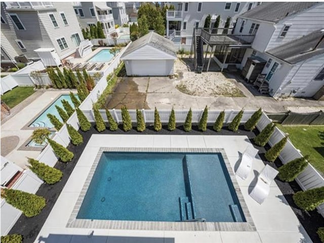 5765 Ocean Dr, Avalon, NJ 08202 - view of pool with a fenced backyard
