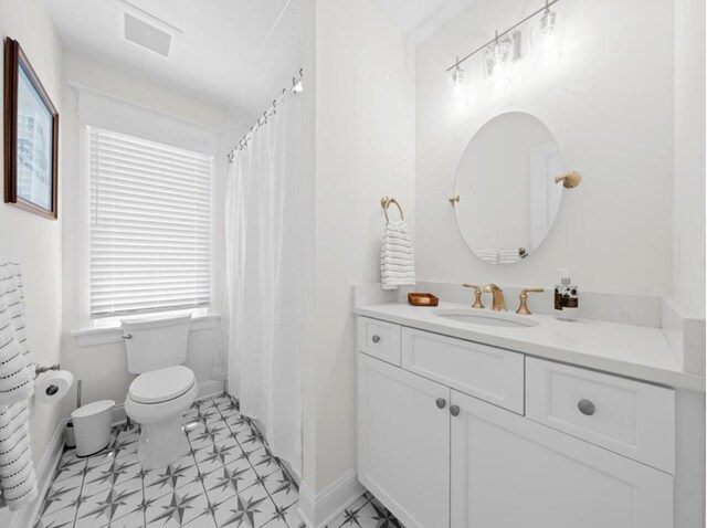 5765 Ocean Dr, Avalon, NJ 08202 - full bathroom featuring toilet, vanity, baseboards, and curtained shower