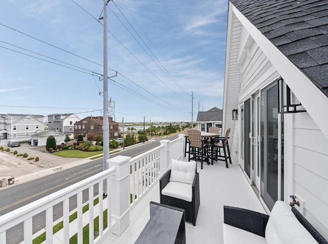 5765 Ocean Dr, Avalon, NJ 08202 - balcony with a residential view, outdoor dining area, and outdoor lounge area
