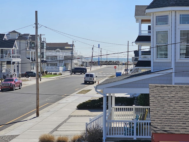 view of road featuring curbs and sidewalks