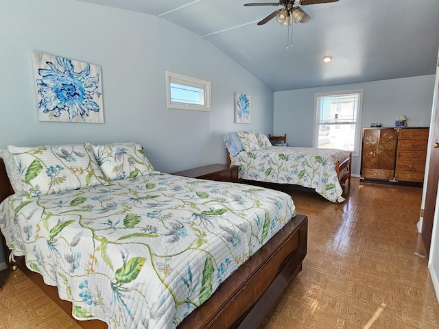 bedroom with lofted ceiling and ceiling fan