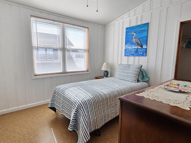 bedroom with lofted ceiling