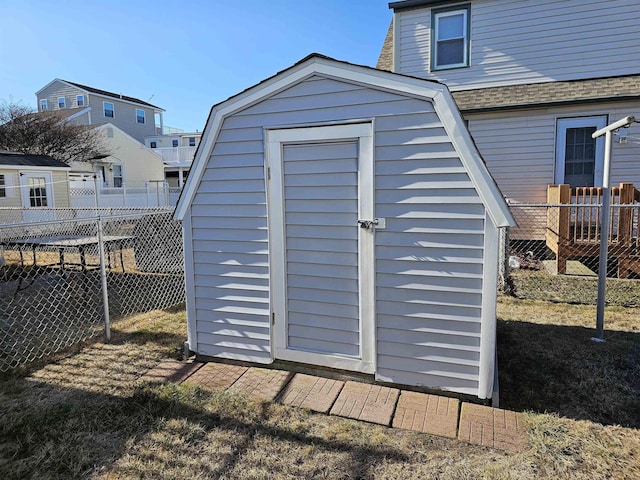 view of shed featuring a fenced backyard