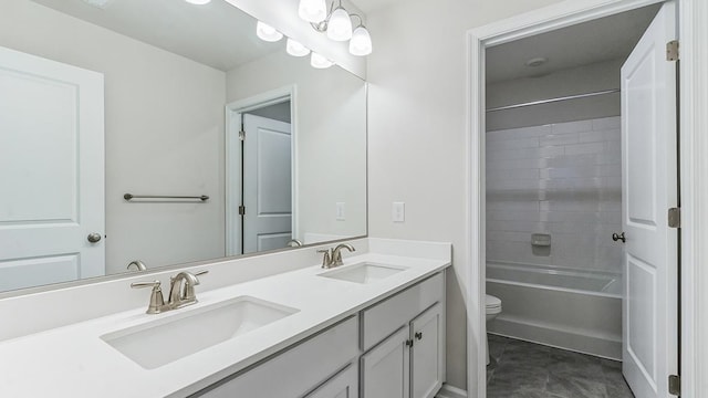 full bathroom with shower / bathing tub combination, tile patterned floors, vanity, and toilet