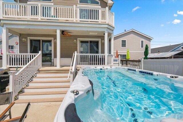 430 W Pine Ave, Wildwood, NJ 08260 - view of pool featuring a pool, a ceiling fan, and a porch