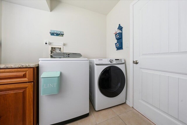 430 W Pine Ave, Wildwood, NJ 08260 - laundry area with light tile patterned floors and independent washer and dryer