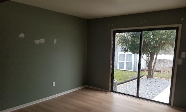1964 E Oak Rd Unit O1, Vineland, NJ 08360 - empty room featuring wood finished floors and baseboards