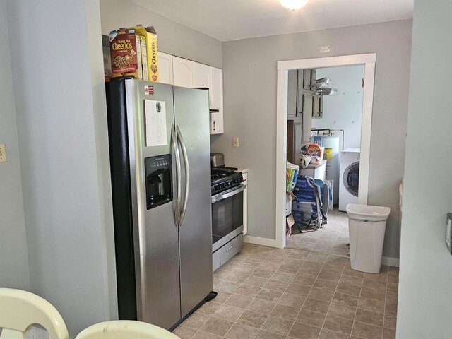 119 Hagen Rd, Clermont, NJ 08210 - kitchen with appliances with stainless steel finishes, washer / dryer, white cabinets, and baseboards