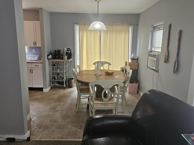 119 Hagen Rd, Clermont, NJ 08210 - dining room with baseboards, cooling unit, and dark tile patterned flooring