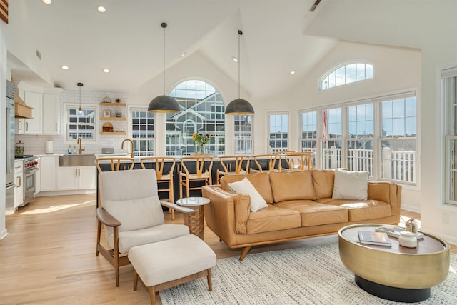 1524 Yacht Ave Unit A, Cape May, NJ 08204 - living room featuring light wood-style floors, high vaulted ceiling, and recessed lighting