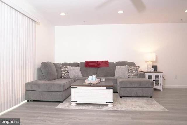 living room with light hardwood / wood-style floors