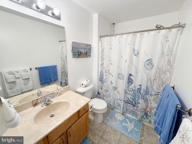 bathroom featuring tile patterned floors, vanity, toilet, and a shower with curtain