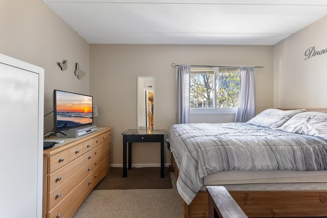 bedroom with light carpet