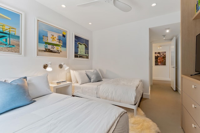 carpeted bedroom with ceiling fan