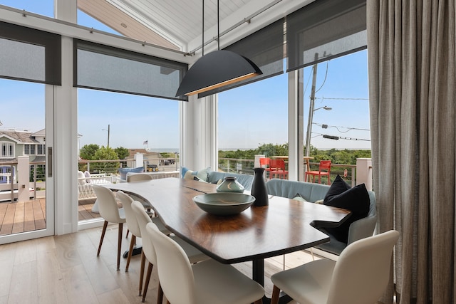 sunroom / solarium with vaulted ceiling and plenty of natural light